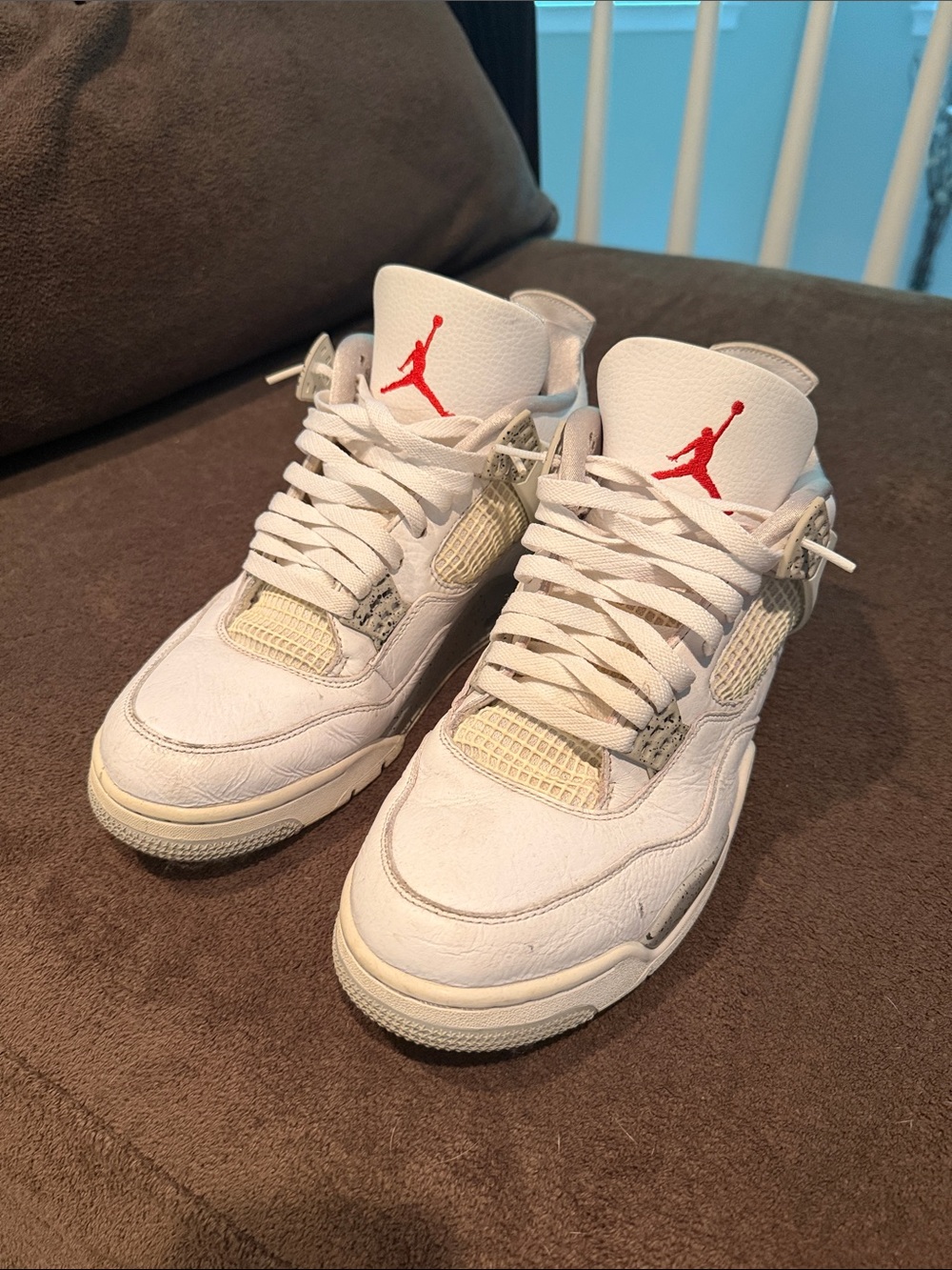 Air Jordan 4 Retro White Sneakers with Red Jumpman